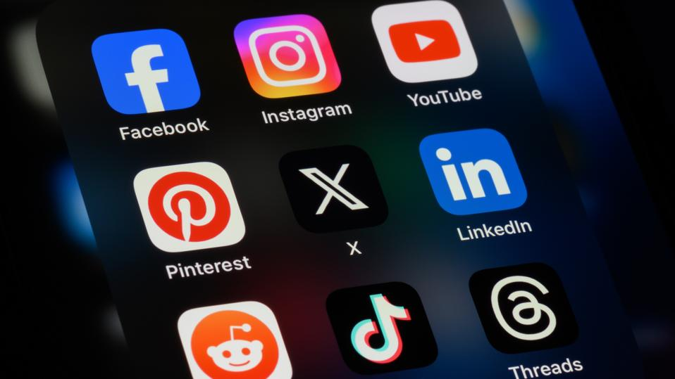 Social media app icons including Facebook, Instagram, YouTube, X, LinkedIn, TikTok and Threads