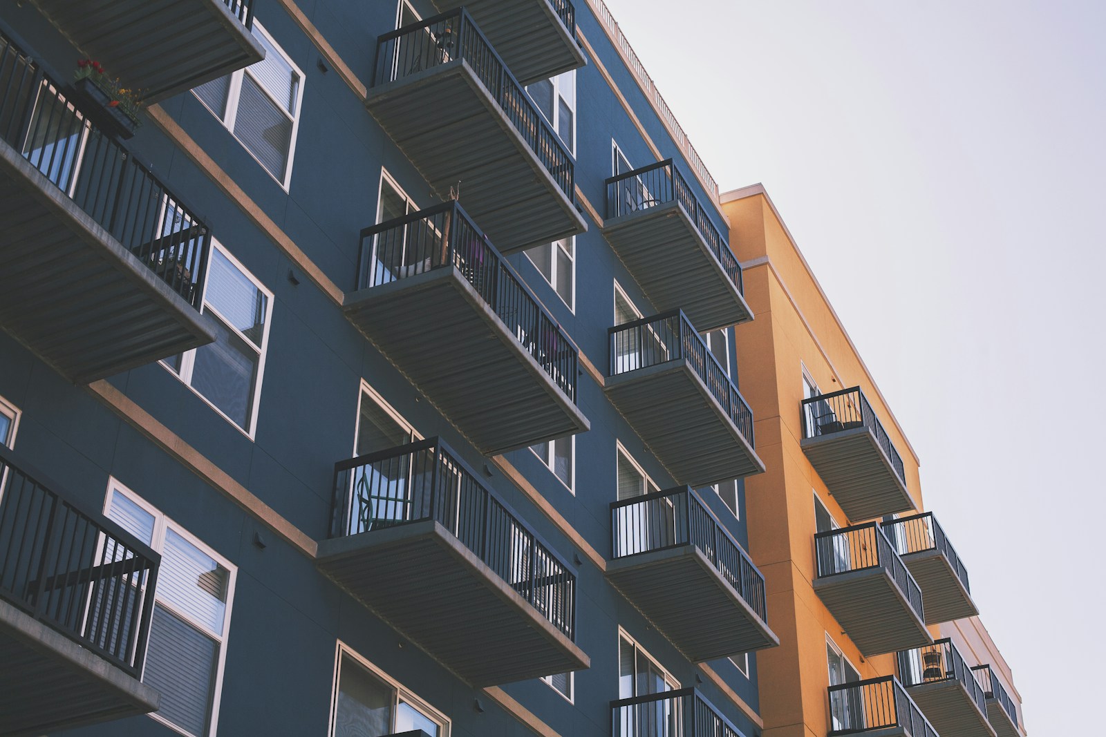 Photograph of a multifamily apartment building with balconies